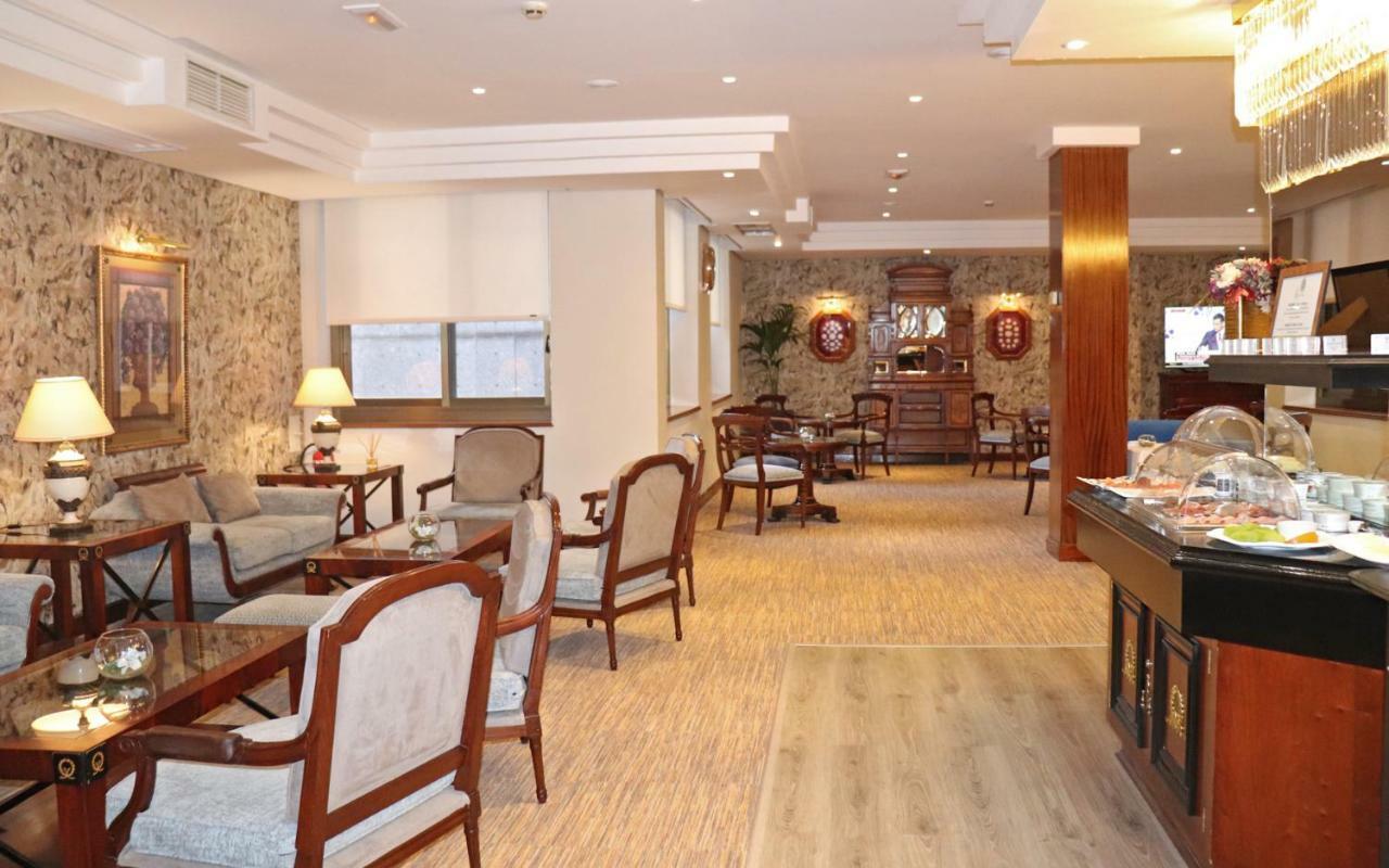 Hotel Miguel Angel Madrid Dış mekan fotoğraf The lounge at the airport